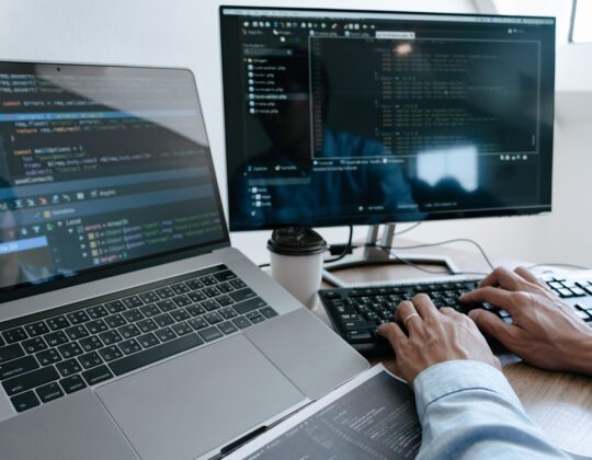 African American man learning computer programming